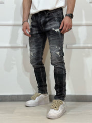 Jeans skinny denim con rotture uomo