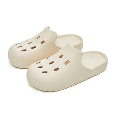 Rubber slipper with unisex holes
