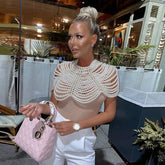 cleopatra pearl top