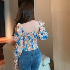 Romantic boho woman low-cut flowers top