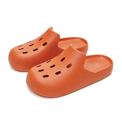 Rubber slipper with unisex holes