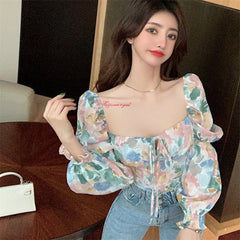 Romantic boho woman low-cut flowers top
