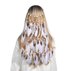Boho hair braid with hanging feathers